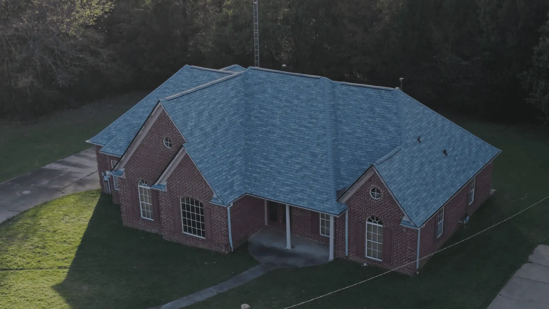 hero old marroon bricked house